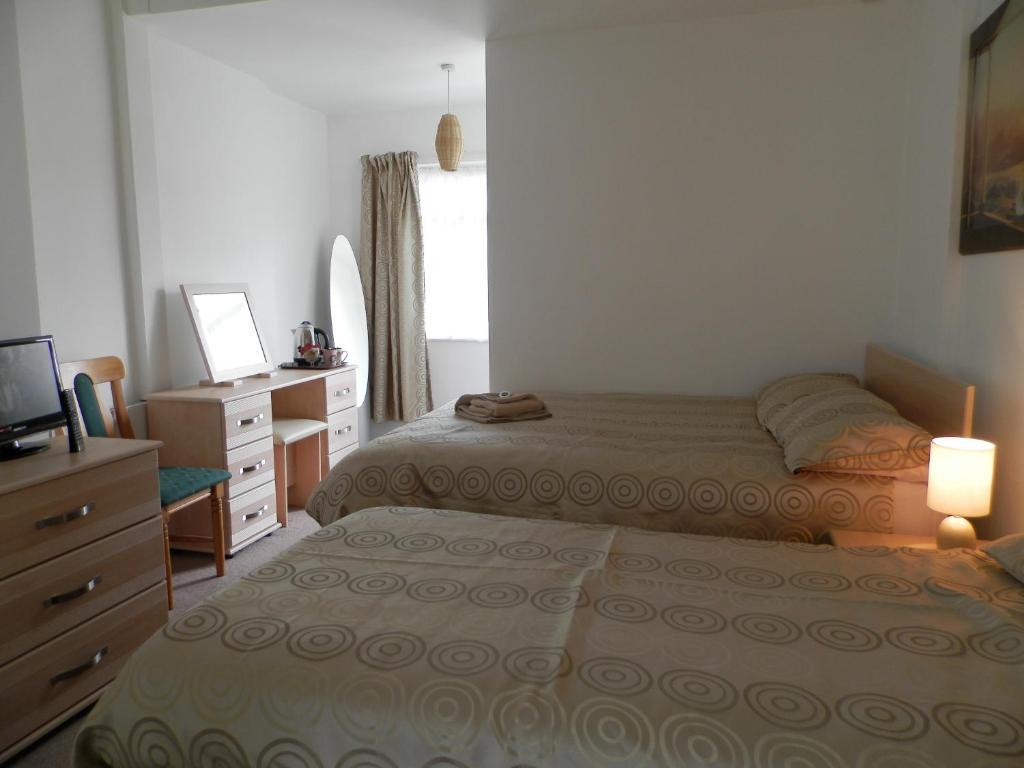 Wayside Cheer Hotel Castel Habitación foto